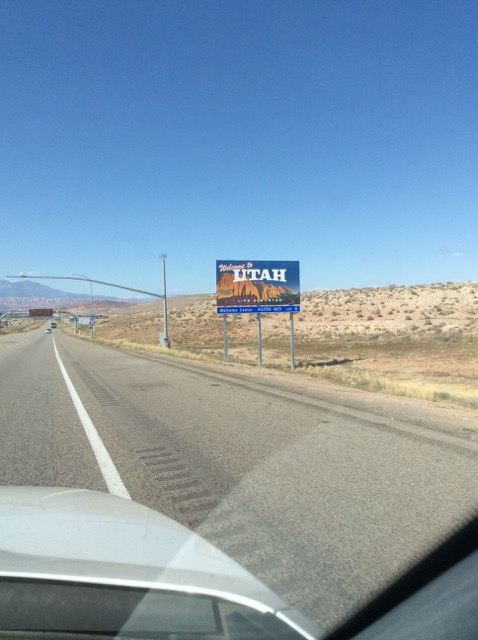 A photo of the welcome to Utah State sign